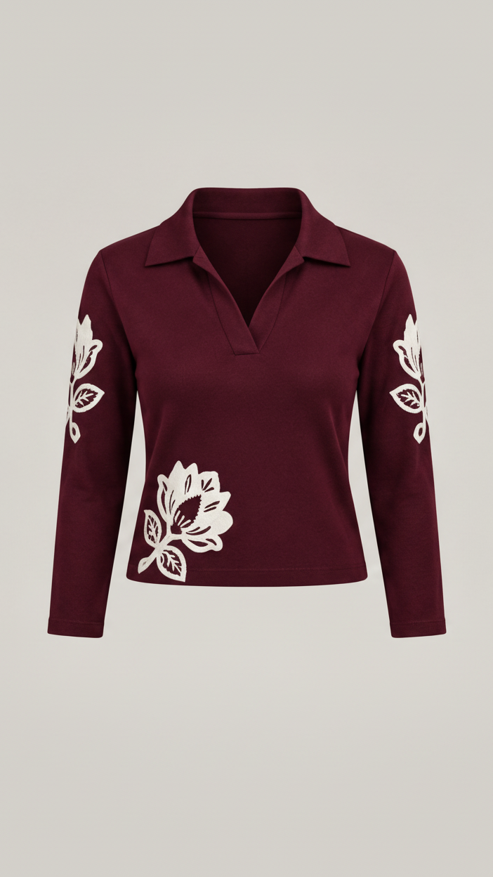 EBK Female maroon long-sleeve polo top with white floral embroidery on sleeves and lower front